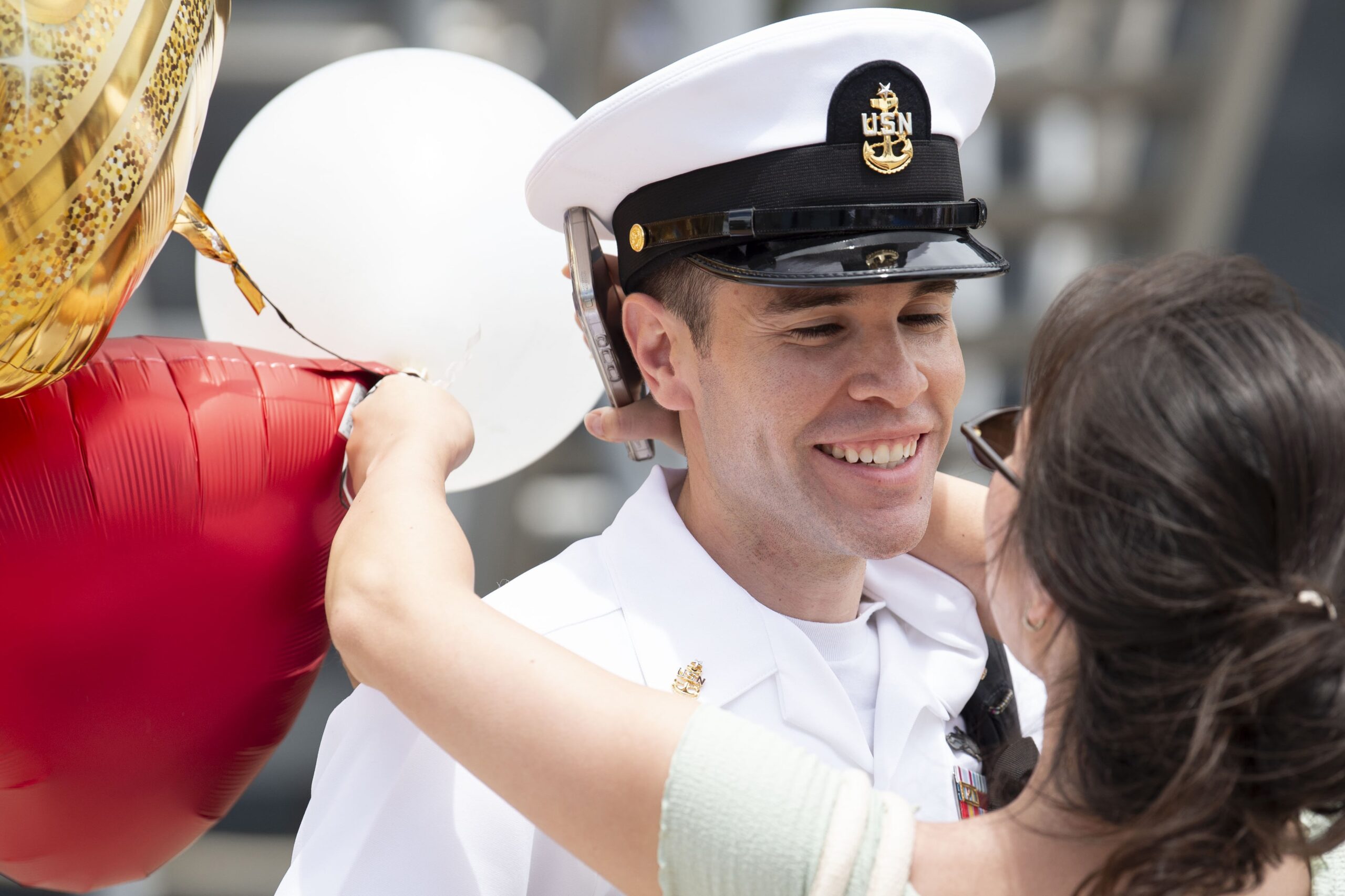 US Service Member hugging loved one